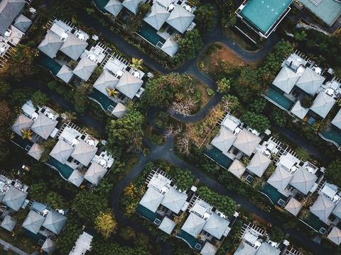 Aerial view of a planned residential estate with landscaped streets